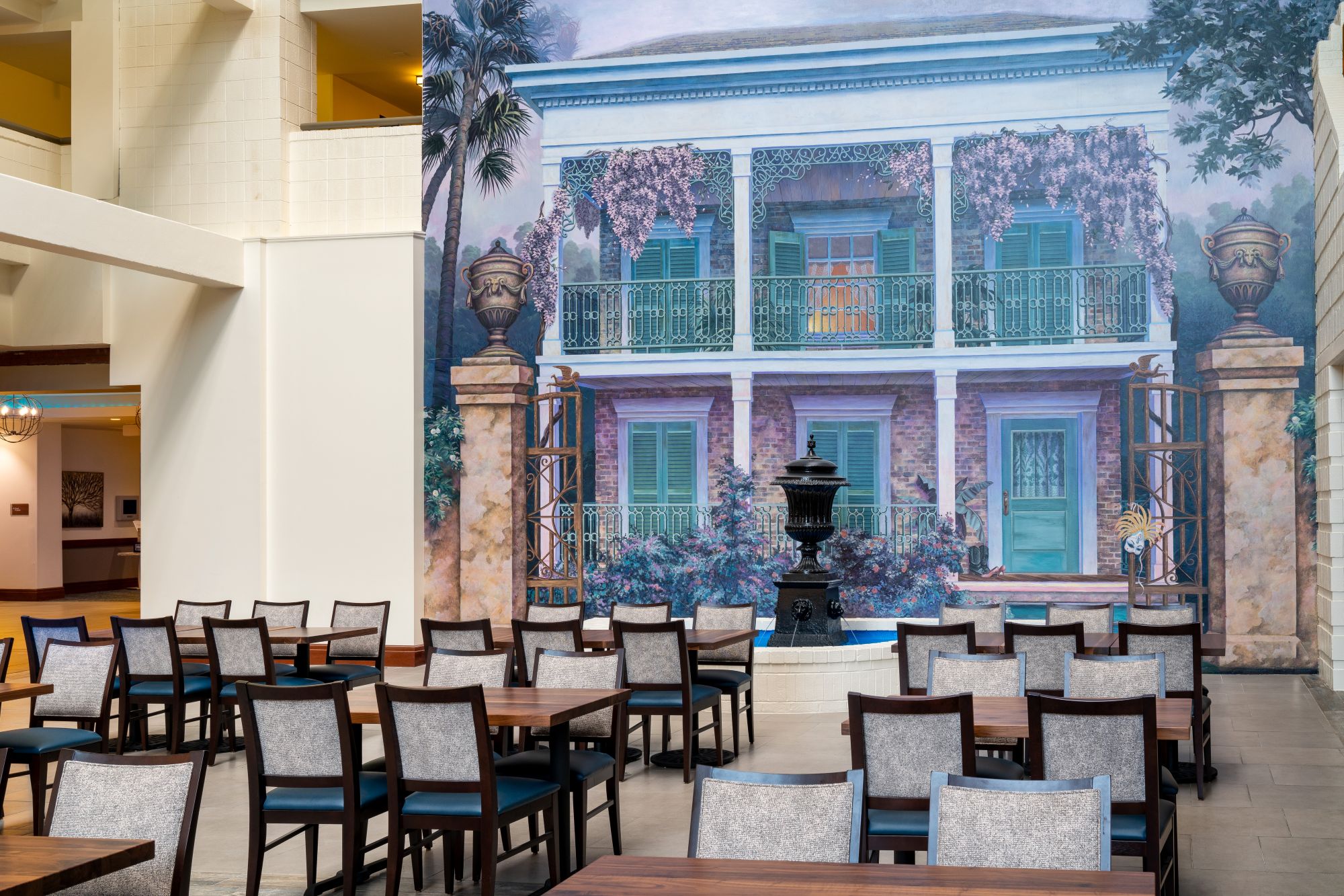 MSYCCES_Atrium_Breakfast_Seating_with_MuralResized