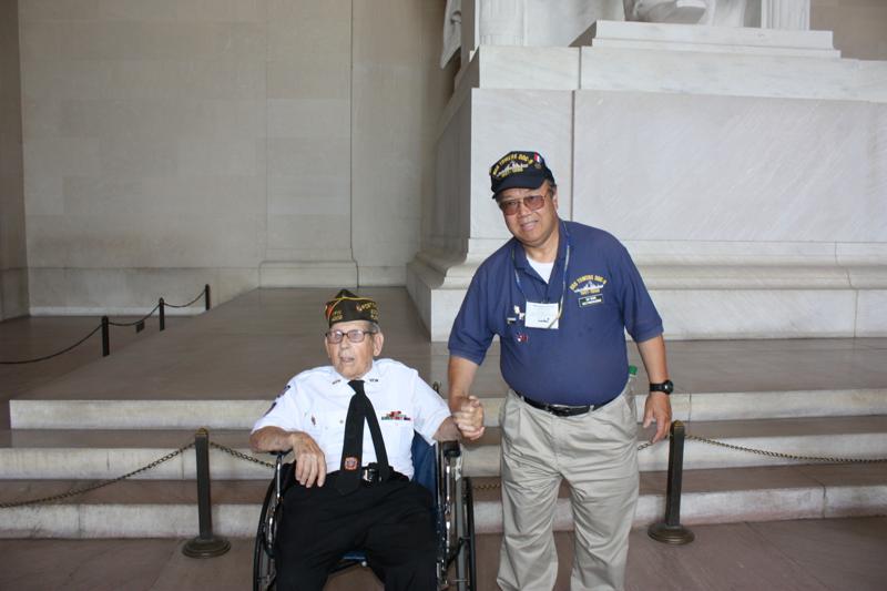 Raymond Wong greets WWII Veteran during visit to the Lincoln Memorial